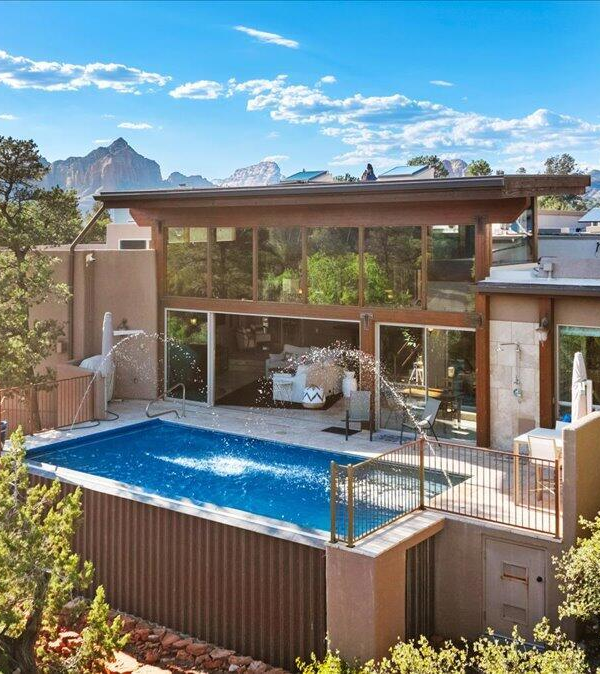 Back view of Sedona home with saltwater pool and Red Rock scenery