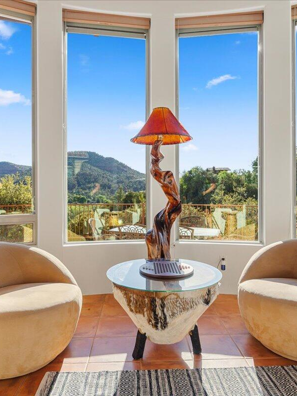 Modern desert home living area with natural light and high ceilings